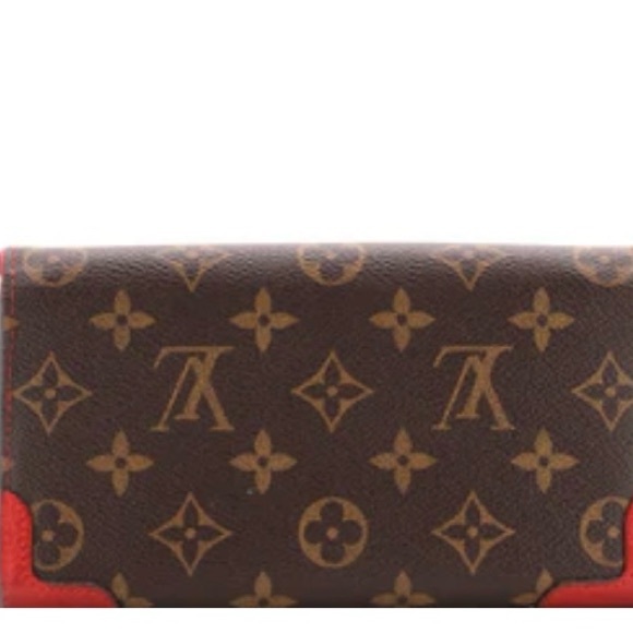 LOUIS VUITTON
MONOGRAM CANVAS SARAH RETIRO WALLET - Picture 9 of 9